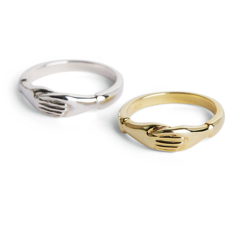 Gold Holding Hands Ring