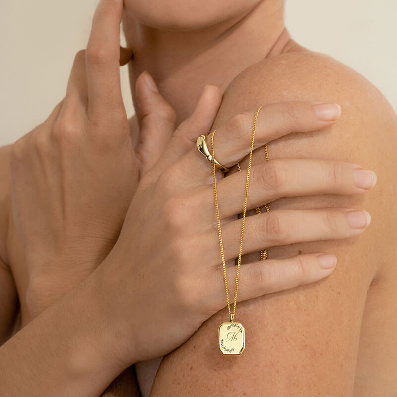 Gold Holding Hands Ring